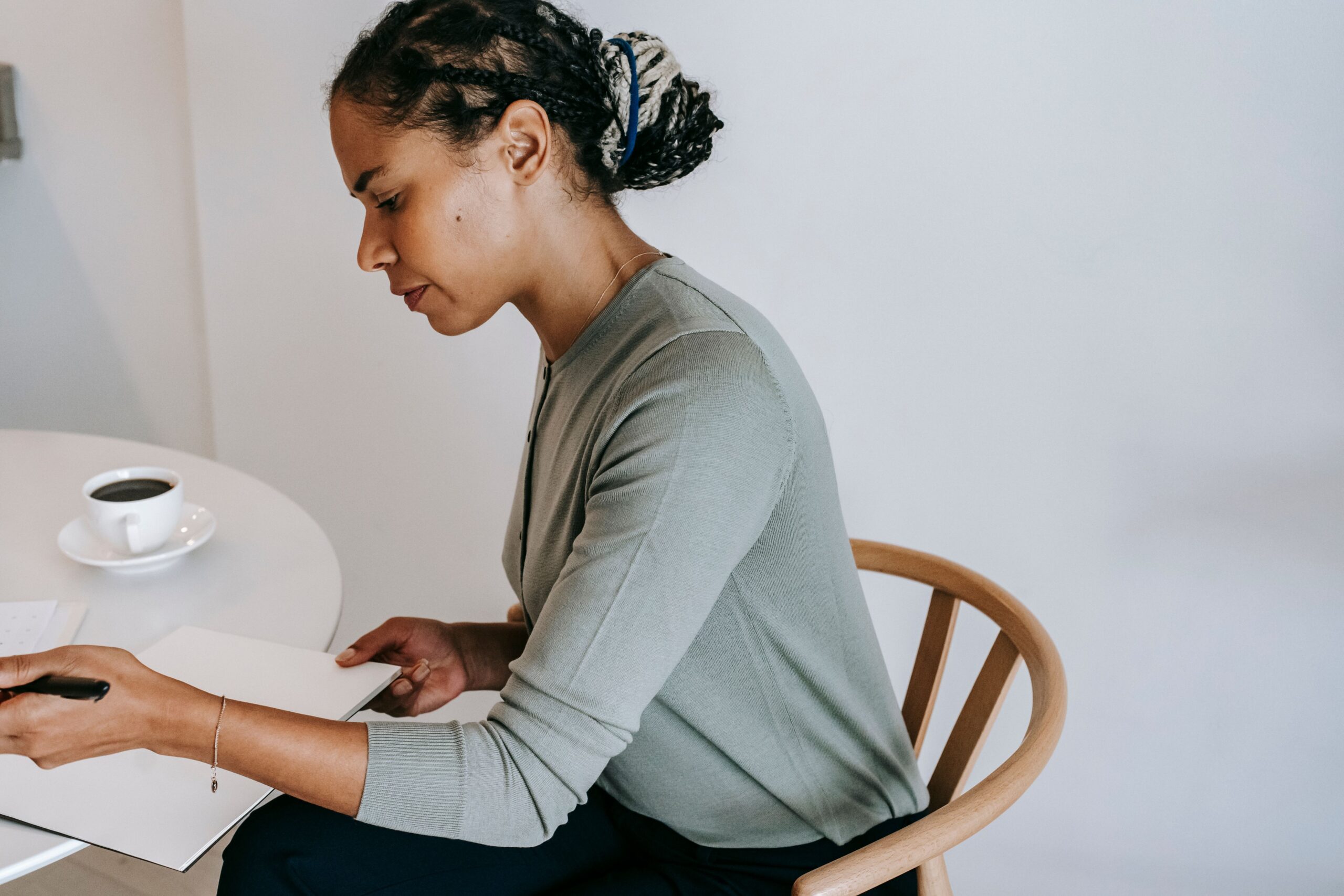 Woman journaling to manage overthinking and anxiety
