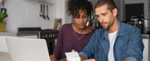 ouple communicating openly about finances to reduce money arguments in their relationship